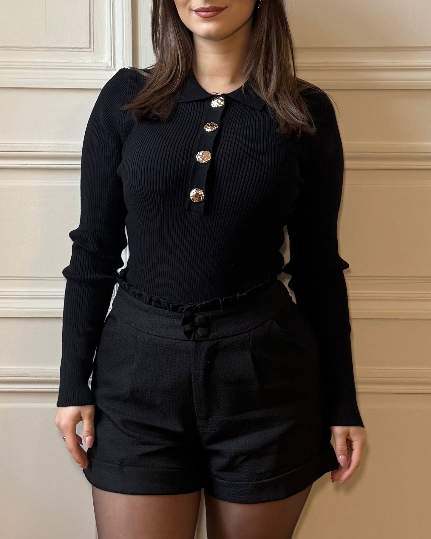 Pull à boutons dorés